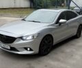 Серый Мазда 6, объемом двигателя 2.5 л и пробегом 215 тыс. км за 10494 $, фото 1 на Automoto.ua