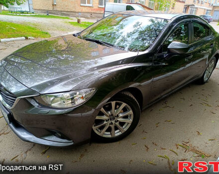 Серый Мазда 6, объемом двигателя 2 л и пробегом 186 тыс. км за 14900 $, фото 1 на Automoto.ua