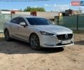Серый Мазда 6, объемом двигателя 2.49 л и пробегом 140 тыс. км за 14000 $, фото 1 на Automoto.ua