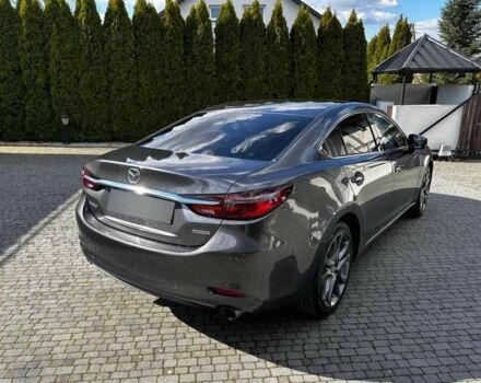 Серый Мазда 6, объемом двигателя 2.5 л и пробегом 75 тыс. км за 12800 $, фото 3 на Automoto.ua