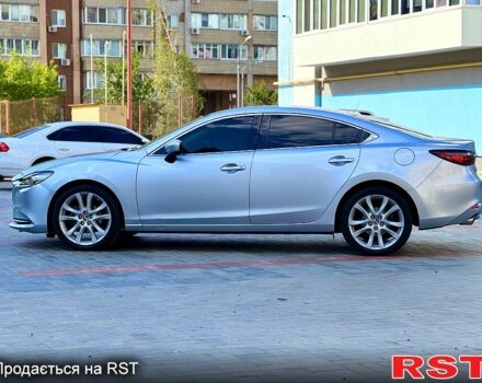 Серый Мазда 6, объемом двигателя 2.5 л и пробегом 106 тыс. км за 15499 $, фото 1 на Automoto.ua