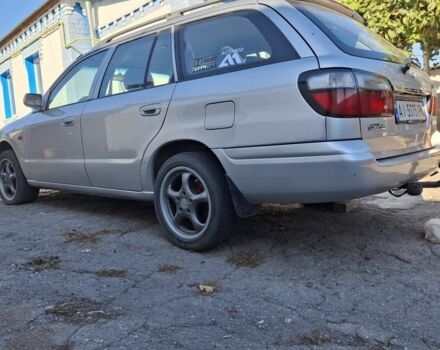 Серый Мазда 6, объемом двигателя 2 л и пробегом 260 тыс. км за 3000 $, фото 2 на Automoto.ua