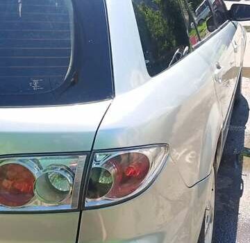 Серый Мазда 6, объемом двигателя 2 л и пробегом 246 тыс. км за 4000 $, фото 3 на Automoto.ua