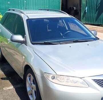 Серый Мазда 6, объемом двигателя 2 л и пробегом 246 тыс. км за 4000 $, фото 2 на Automoto.ua