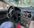 Серый Мазда 6, объемом двигателя 2 л и пробегом 320 тыс. км за 3600 $, фото 4 на Automoto.ua
