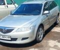 Серый Мазда 6, объемом двигателя 2 л и пробегом 246 тыс. км за 4000 $, фото 1 на Automoto.ua