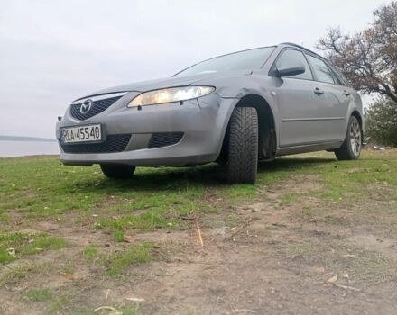 Серый Мазда 6, объемом двигателя 2 л и пробегом 296 тыс. км за 3300 $, фото 1 на Automoto.ua