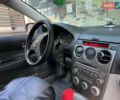 Серый Мазда 6, объемом двигателя 2 л и пробегом 320 тыс. км за 3400 $, фото 4 на Automoto.ua