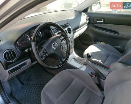 Серый Мазда 6, объемом двигателя 1.8 л и пробегом 314 тыс. км за 5550 $, фото 9 на Automoto.ua