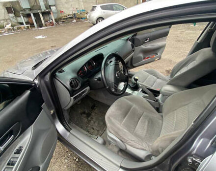 Сірий Мазда 6, об'ємом двигуна 2 л та пробігом 267 тис. км за 3700 $, фото 3 на Automoto.ua