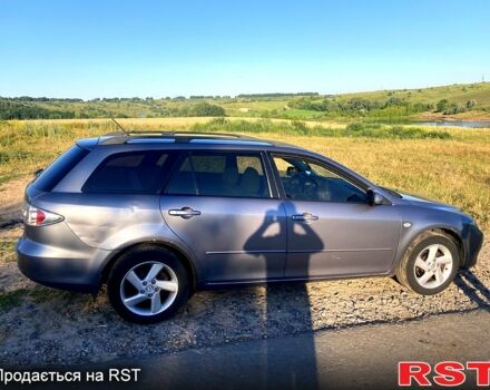 Сірий Мазда 6, об'ємом двигуна 2 л та пробігом 308 тис. км за 3700 $, фото 3 на Automoto.ua
