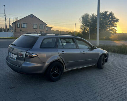 Сірий Мазда 6, об'ємом двигуна 2 л та пробігом 293 тис. км за 1600 $, фото 5 на Automoto.ua