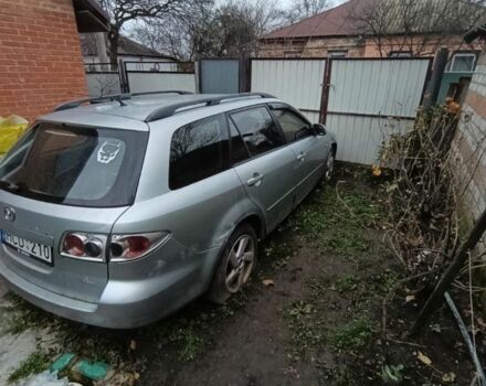 Серый Мазда 6, объемом двигателя 2 л и пробегом 320 тыс. км за 1691 $, фото 1 на Automoto.ua