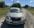 Серый Мазда 6, объемом двигателя 2 л и пробегом 350 тыс. км за 716 $, фото 1 на Automoto.ua