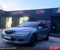 Сірий Мазда 6, об'ємом двигуна 2 л та пробігом 326 тис. км за 3550 $, фото 1 на Automoto.ua