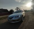 Сірий Мазда 6, об'ємом двигуна 2 л та пробігом 444 тис. км за 2244 $, фото 1 на Automoto.ua