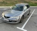 Серый Мазда 6, объемом двигателя 2 л и пробегом 250 тыс. км за 2000 $, фото 1 на Automoto.ua