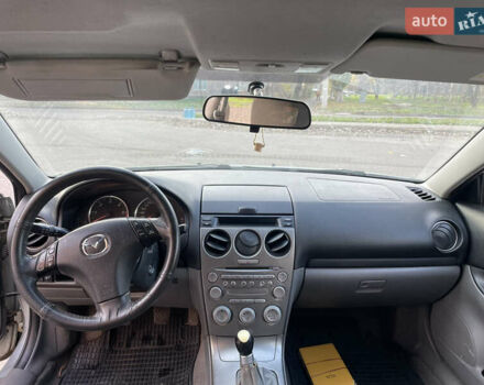 Серый Мазда 6, объемом двигателя 2 л и пробегом 399 тыс. км за 3100 $, фото 6 на Automoto.ua