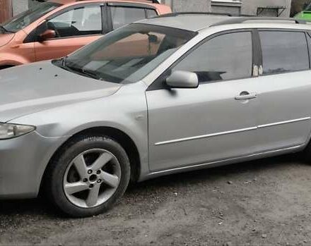 Серый Мазда 6, объемом двигателя 2 л и пробегом 320 тыс. км за 3500 $, фото 2 на Automoto.ua
