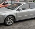 Серый Мазда 6, объемом двигателя 2 л и пробегом 320 тыс. км за 3500 $, фото 2 на Automoto.ua