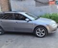 Серый Мазда 6, объемом двигателя 1.8 л и пробегом 289 тыс. км за 4200 $, фото 1 на Automoto.ua