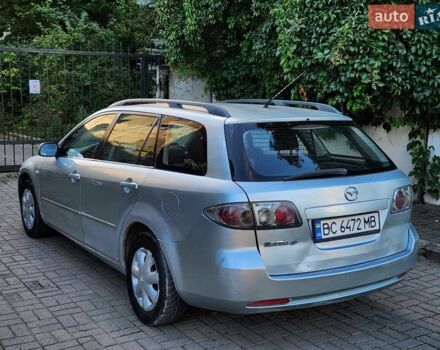 Сірий Мазда 6, об'ємом двигуна 2 л та пробігом 411 тис. км за 1950 $, фото 4 на Automoto.ua