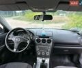 Серый Мазда 6, объемом двигателя 2 л и пробегом 312 тыс. км за 2700 $, фото 1 на Automoto.ua
