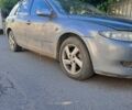Сірий Мазда 6, об'ємом двигуна 2 л та пробігом 300 тис. км за 1155 $, фото 2 на Automoto.ua