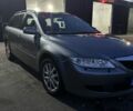 Серый Мазда 6, объемом двигателя 2 л и пробегом 246 тыс. км за 2100 $, фото 1 на Automoto.ua