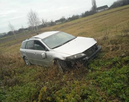 Серый Мазда 6, объемом двигателя 1.8 л и пробегом 200 тыс. км за 1111 $, фото 1 на Automoto.ua