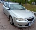 Серый Мазда 6, объемом двигателя 2 л и пробегом 350 тыс. км за 3076 $, фото 1 на Automoto.ua