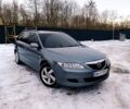 Сірий Мазда 6, об'ємом двигуна 2 л та пробігом 320 тис. км за 2299 $, фото 1 на Automoto.ua