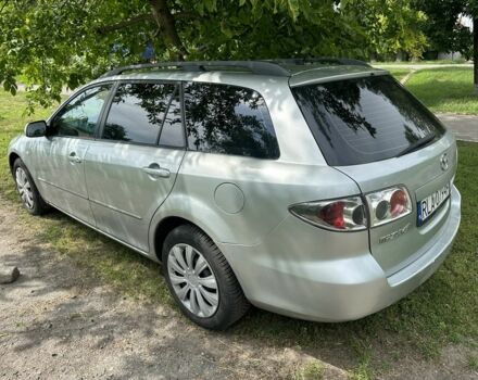 Серый Мазда 6, объемом двигателя 2 л и пробегом 300 тыс. км за 2350 $, фото 1 на Automoto.ua