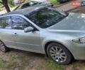 Серый Мазда 6, объемом двигателя 2 л и пробегом 348 тыс. км за 2900 $, фото 1 на Automoto.ua