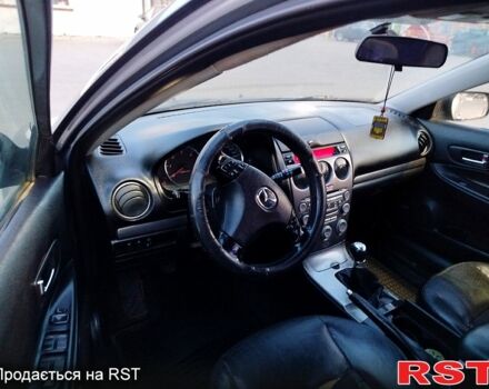 Серый Мазда 6, объемом двигателя 2 л и пробегом 250 тыс. км за 2850 $, фото 6 на Automoto.ua