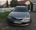 Серый Мазда 6, объемом двигателя 2 л и пробегом 334 тыс. км за 1900 $, фото 1 на Automoto.ua