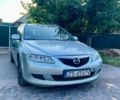 Серый Мазда 6, объемом двигателя 2 л и пробегом 300 тыс. км за 1850 $, фото 3 на Automoto.ua