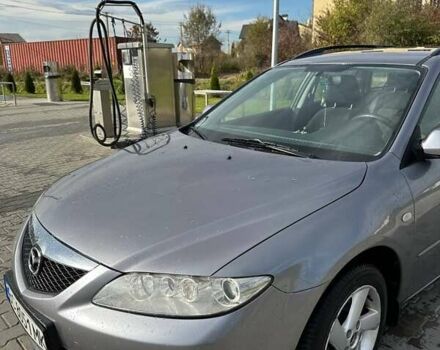 Серый Мазда 6, объемом двигателя 2 л и пробегом 260 тыс. км за 3900 $, фото 1 на Automoto.ua
