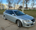 Серый Мазда 6, объемом двигателя 2 л и пробегом 335 тыс. км за 3900 $, фото 1 на Automoto.ua