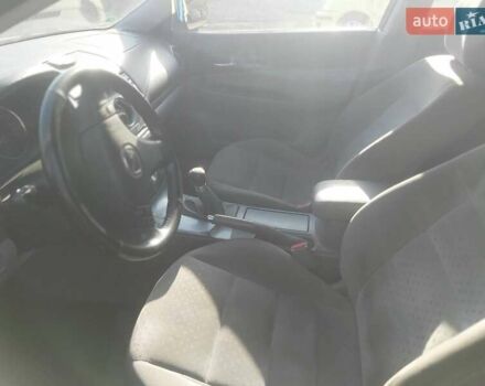 Серый Мазда 6, объемом двигателя 2 л и пробегом 309 тыс. км за 3800 $, фото 7 на Automoto.ua