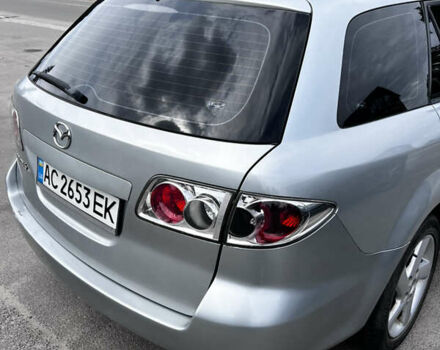 Серый Мазда 6, объемом двигателя 1.8 л и пробегом 30 тыс. км за 2800 $, фото 2 на Automoto.ua