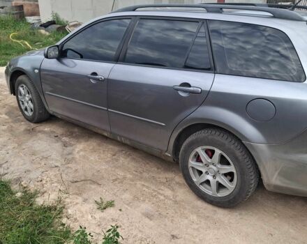 Серый Мазда 6, объемом двигателя 2 л и пробегом 300 тыс. км за 3000 $, фото 2 на Automoto.ua