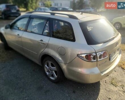 Серый Мазда 6, объемом двигателя 2 л и пробегом 309 тыс. км за 3800 $, фото 2 на Automoto.ua