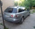 Серый Мазда 6, объемом двигателя 2 л и пробегом 324 тыс. км за 4000 $, фото 1 на Automoto.ua