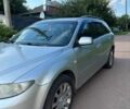 Серый Мазда 6, объемом двигателя 2 л и пробегом 344 тыс. км за 4200 $, фото 2 на Automoto.ua