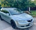 Серый Мазда 6, объемом двигателя 2 л и пробегом 300 тыс. км за 1850 $, фото 1 на Automoto.ua