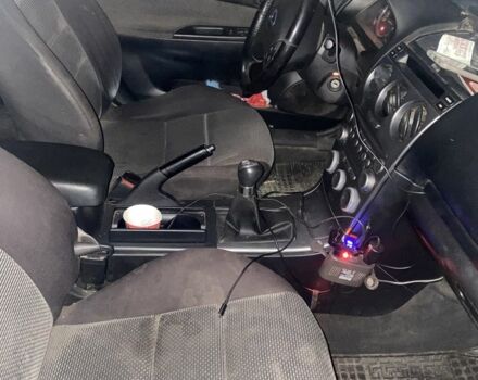 Серый Мазда 6, объемом двигателя 2 л и пробегом 300 тыс. км за 2000 $, фото 5 на Automoto.ua