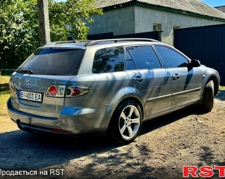 Серый Мазда 6, объемом двигателя 1.8 л и пробегом 200 тыс. км за 4999 $, фото 2 на Automoto.ua