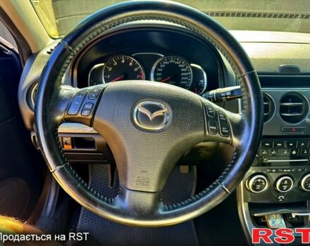 Серый Мазда 6, объемом двигателя 1.8 л и пробегом 200 тыс. км за 4999 $, фото 9 на Automoto.ua