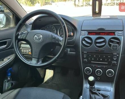 Серый Мазда 6, объемом двигателя 2 л и пробегом 331 тыс. км за 3700 $, фото 12 на Automoto.ua
